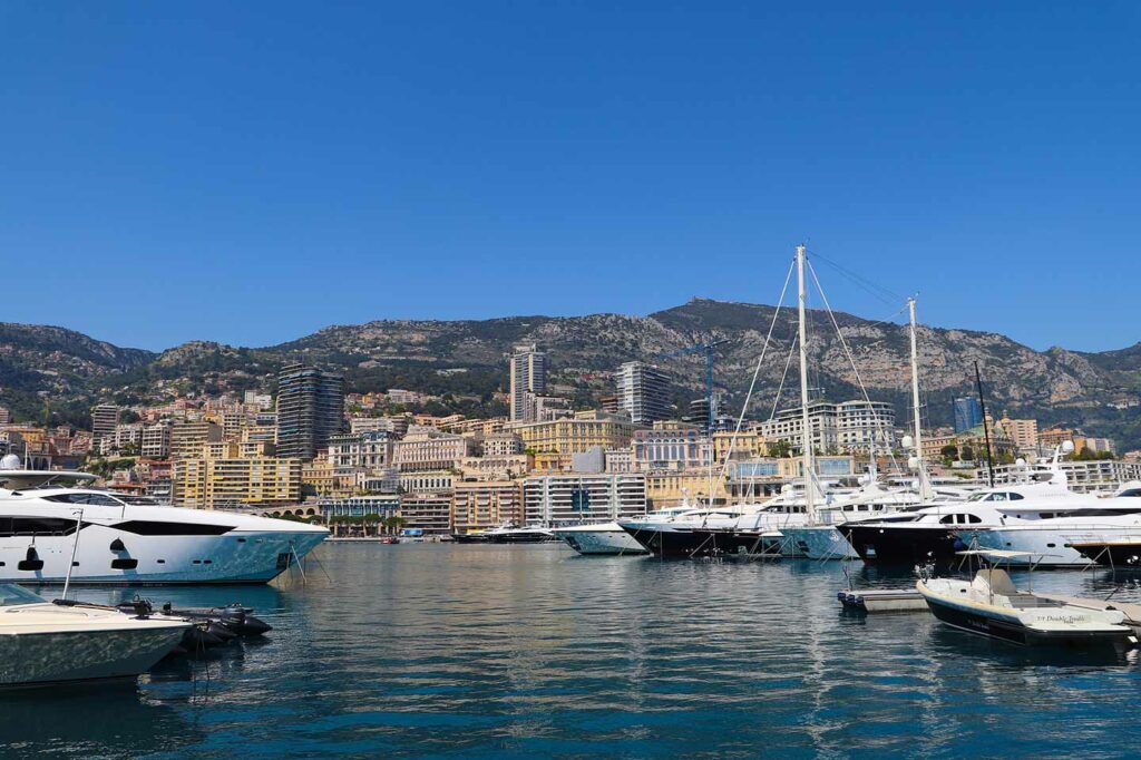 sea view of luxury yachts and white boats in monaco harbour