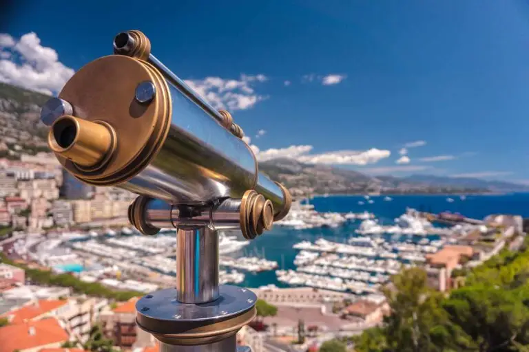close up of a telescope looking onto monaco bay