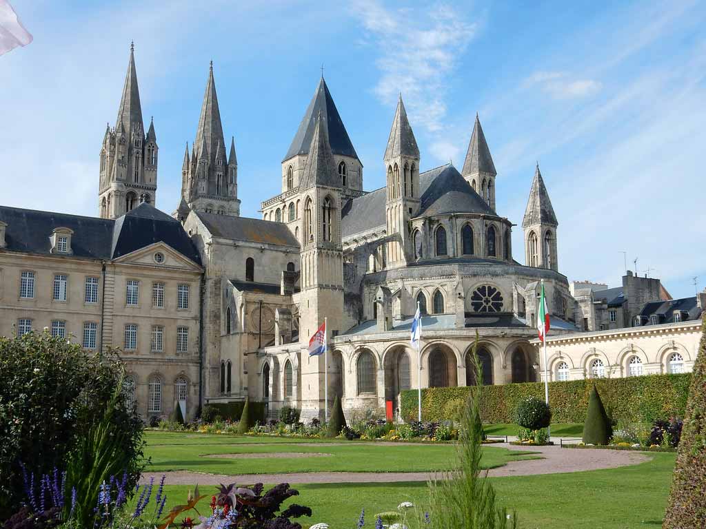Guests enjoying a guided tour of Saint Etienne Abbey.