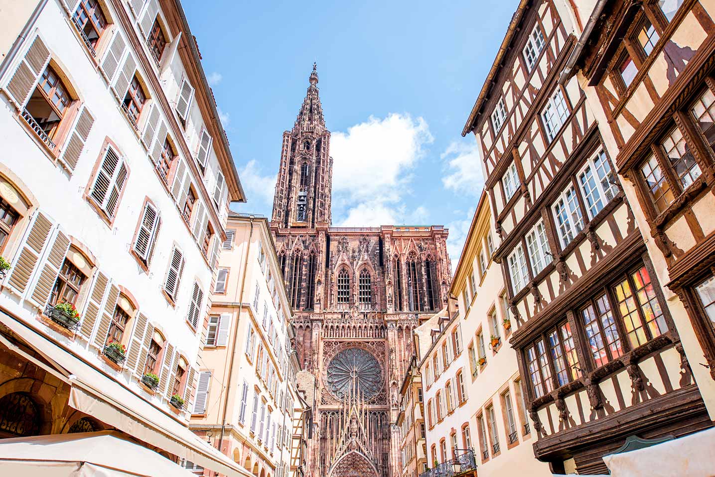 Strasbourg Cathedral coming into view over local houses